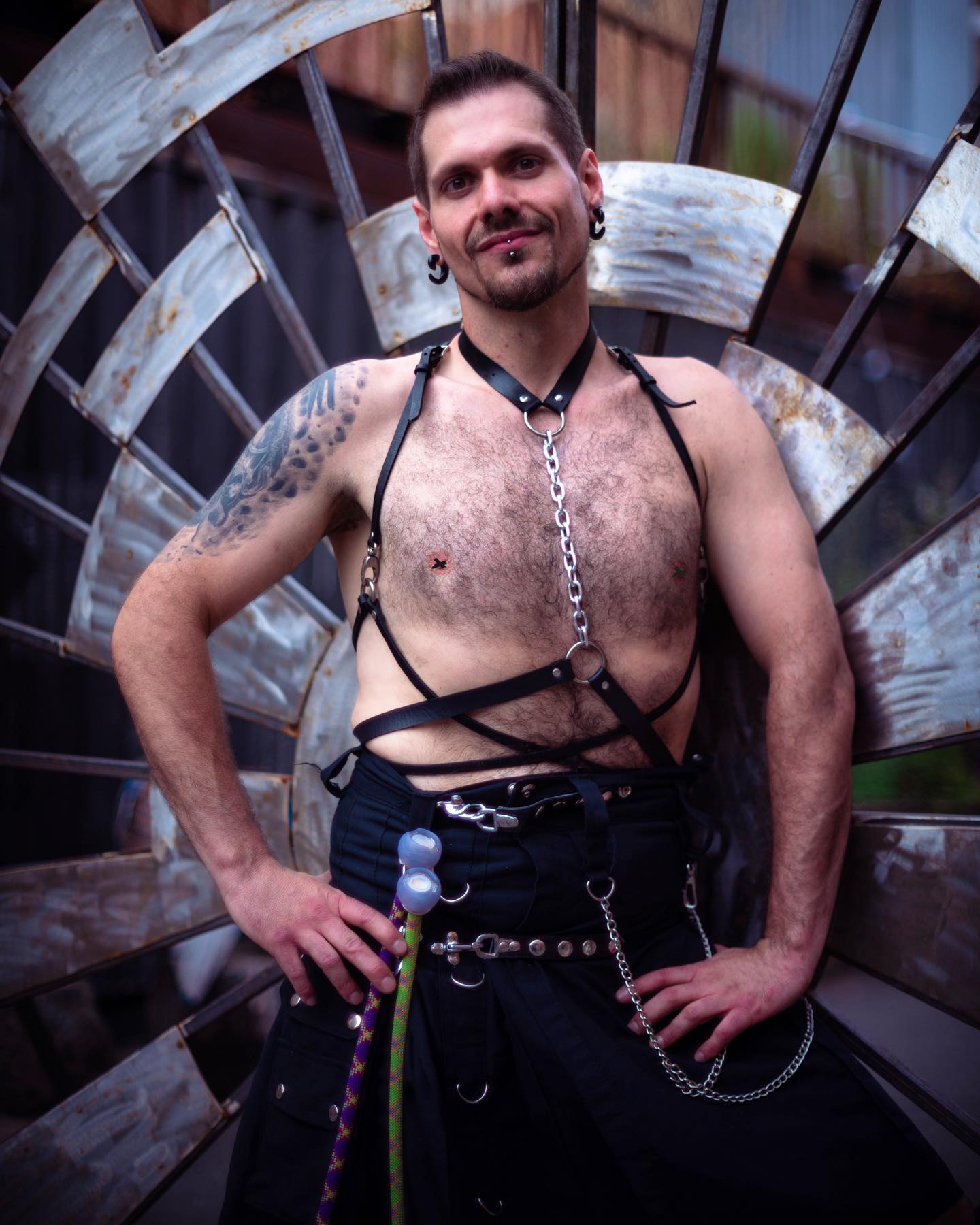 Fabiano posing with his poi in a promotional portrait at Sage Beach